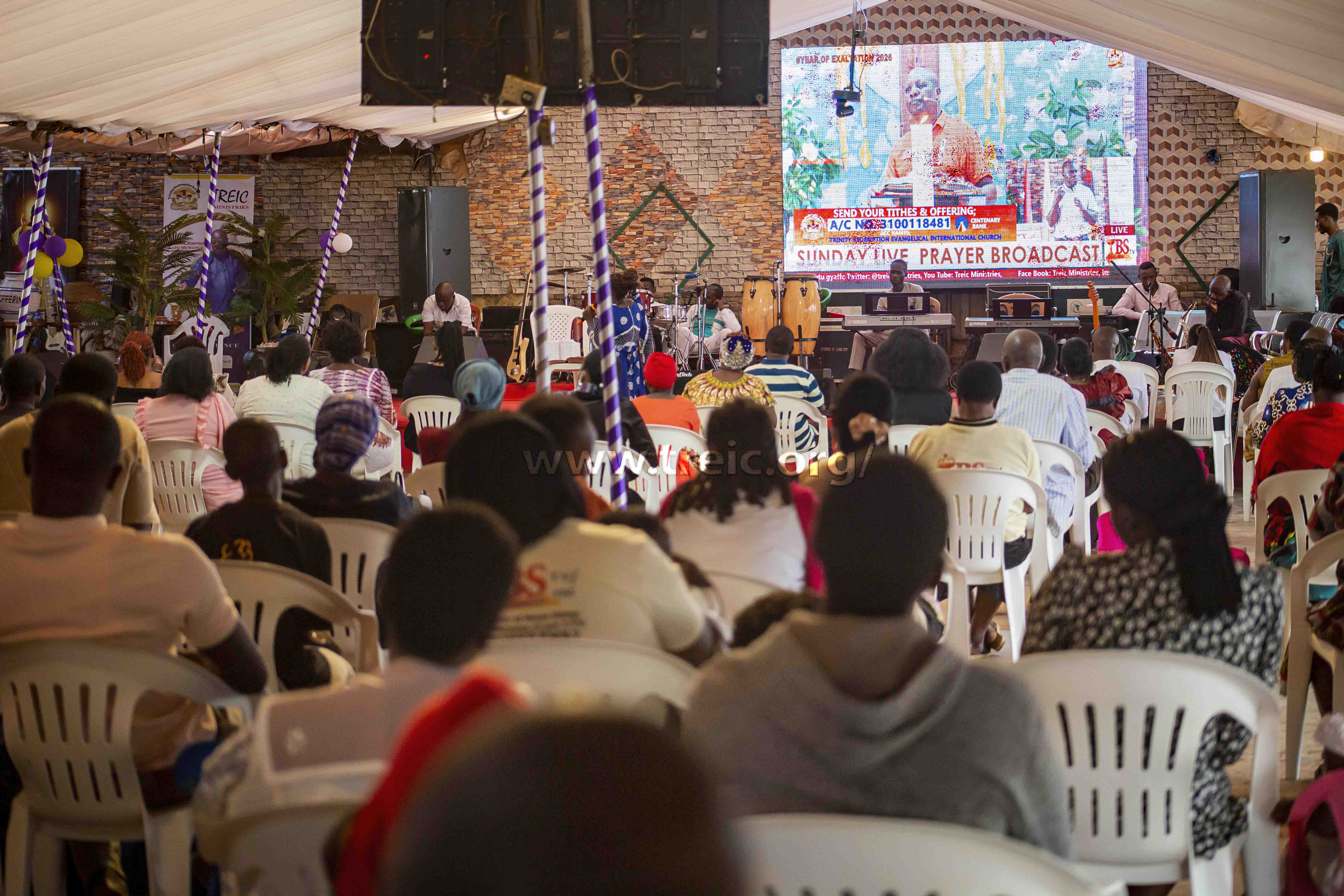 People listening to the preaching of the day