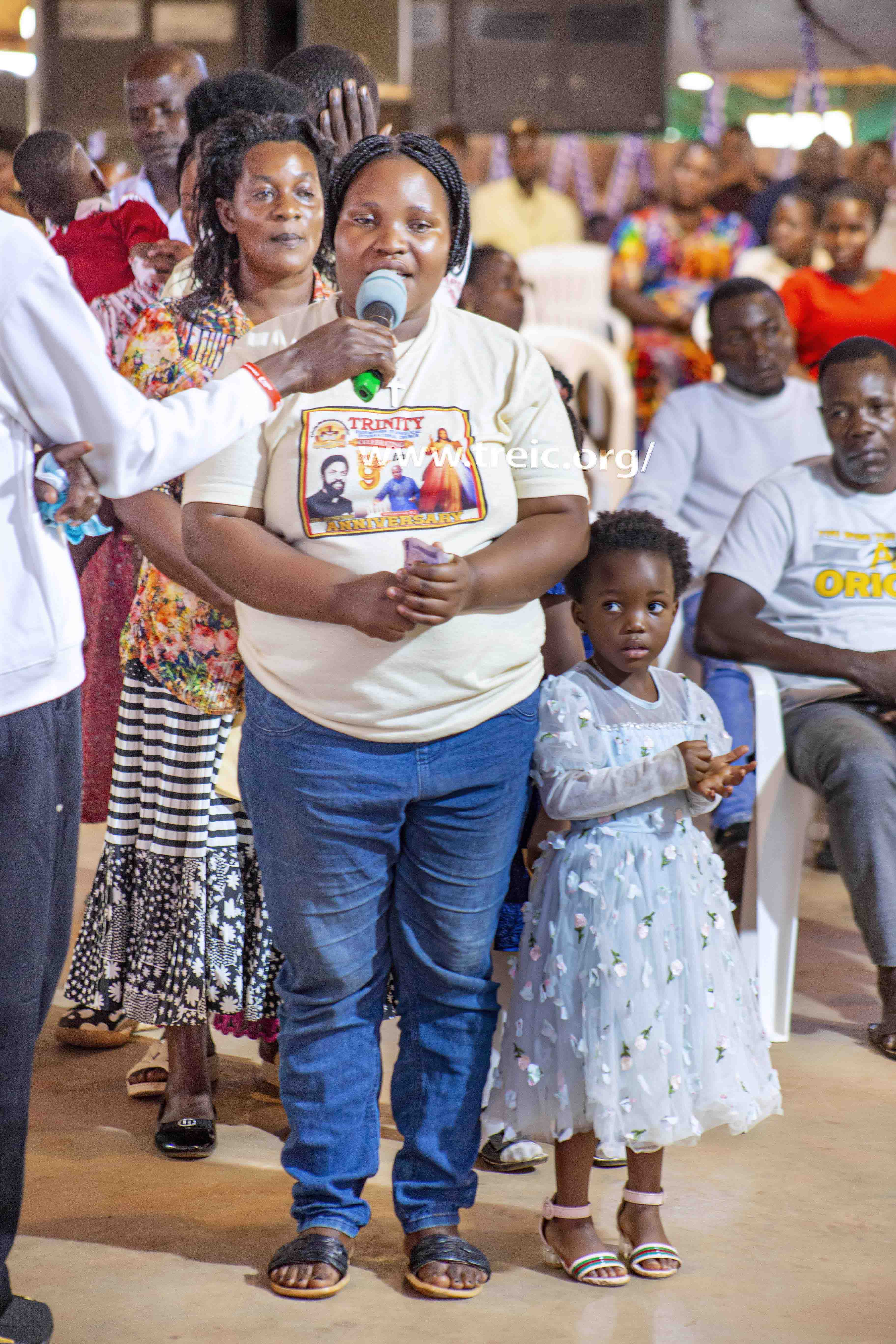 Nakavuma Sarah glorifying Jesus Christ for healing her from painful teeth, and providing security to their children.