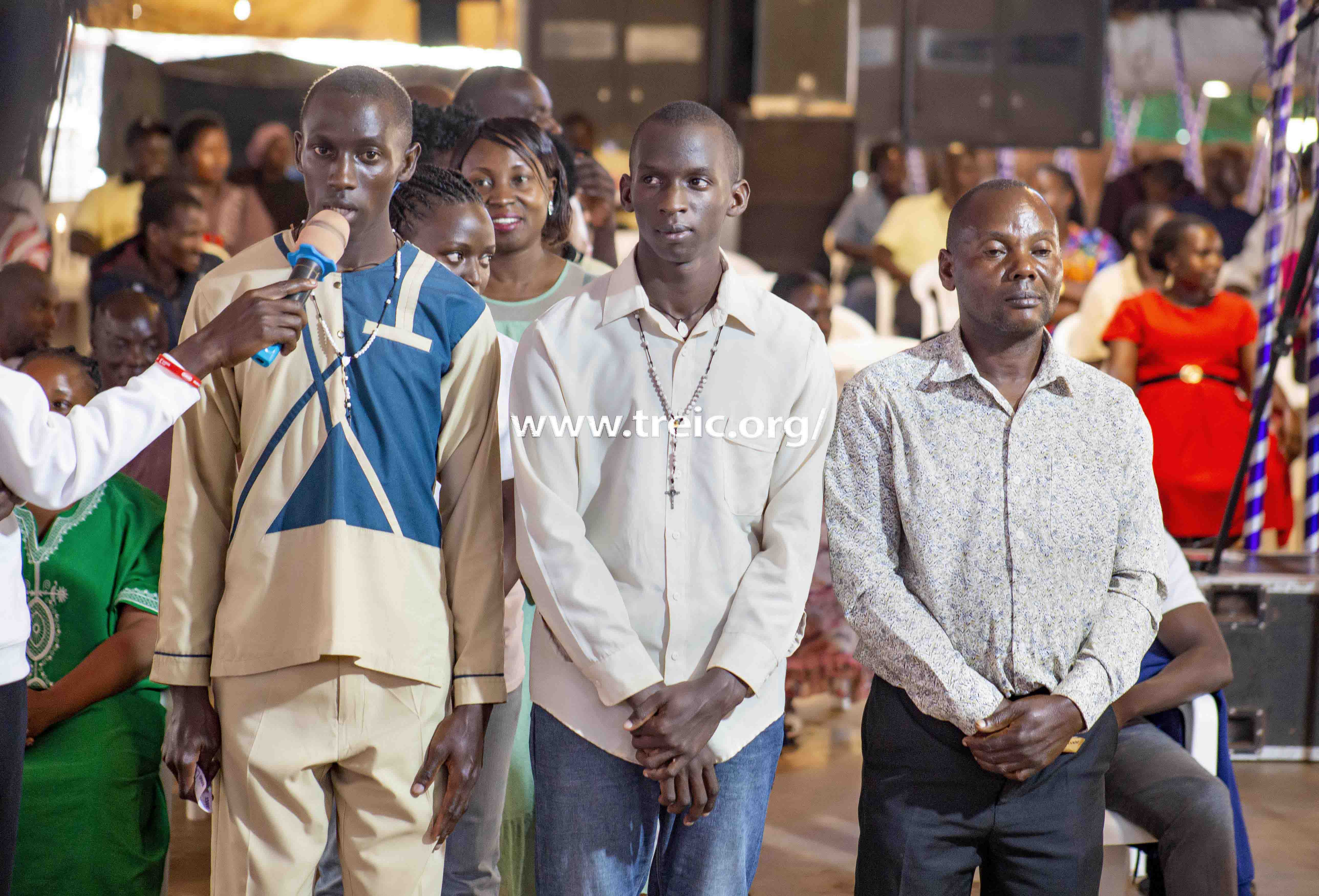 Kasirye Joseph  testifying for getting school fees on time, and healing from a painful headache.